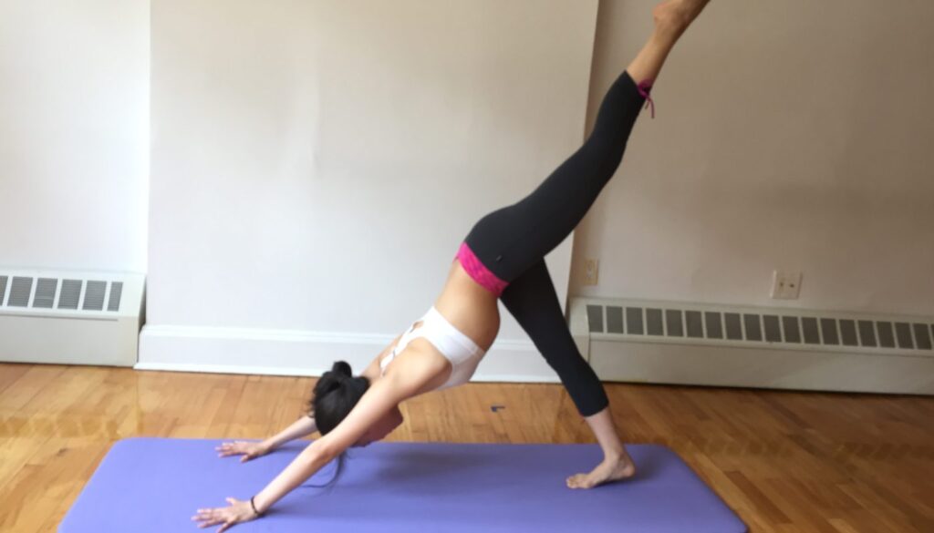 Yan practising a yoga pose - Yan Yoga gallery