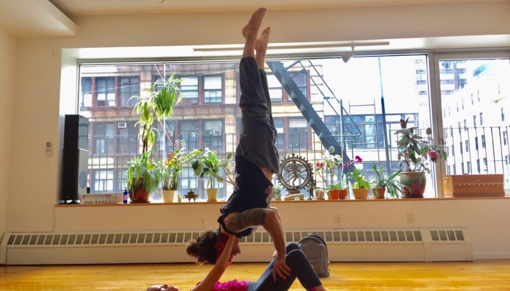 Yan holding a yoga posture - Yan Yoga gallery